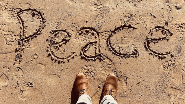 beach_writing_peace_boots