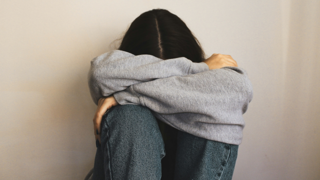 head_in_hands_sitting_sad_unsplash