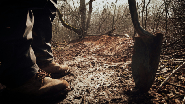 shovelling_mud_boots_unsplash