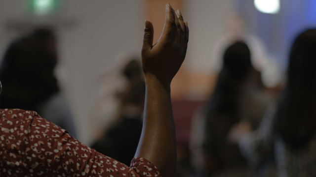 arm_worship_church_congregation_unsplash