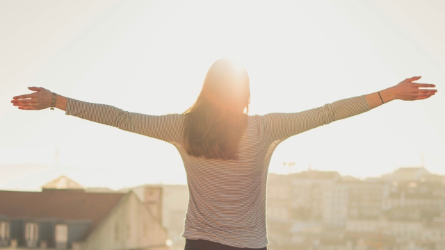 balcony_sunshine_arms_outstretched