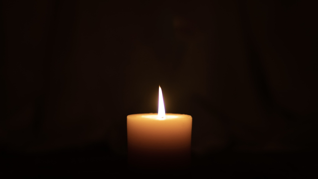 candle_dark_flame_memory_unsplash