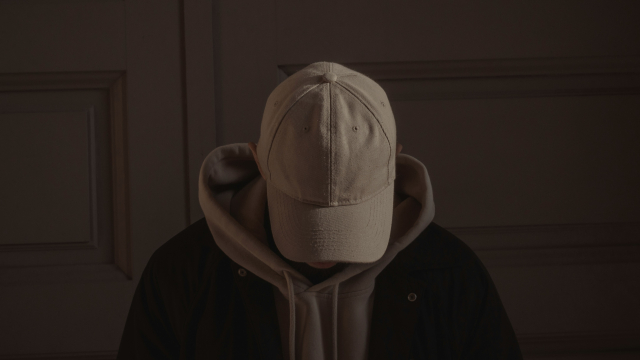 cap_bowed_head_unsplash