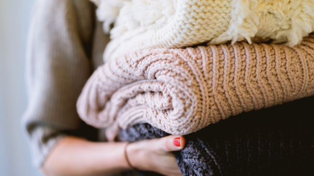 carrying_blankets_laundry_unsplash