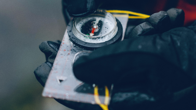 compass_gloves_walking_unsplash