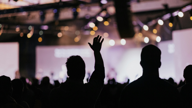 crowd_singing_silhouette_hands_unsplash