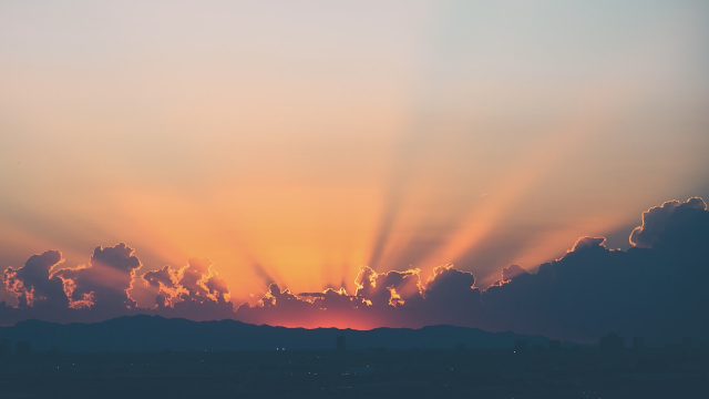 dawn_sunlight_clouds_mountains_unsplash