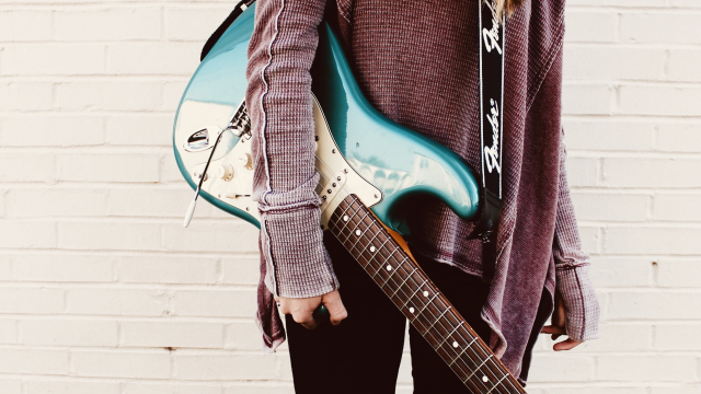 electric_guitar_woman_unsplash