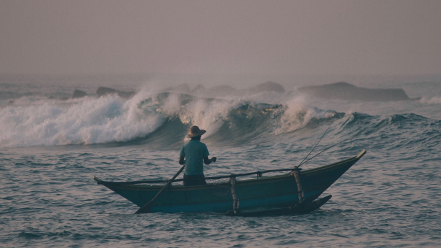 fisherman_boat_waves_unsplash