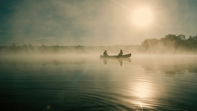 fishing_boat_mist_lake