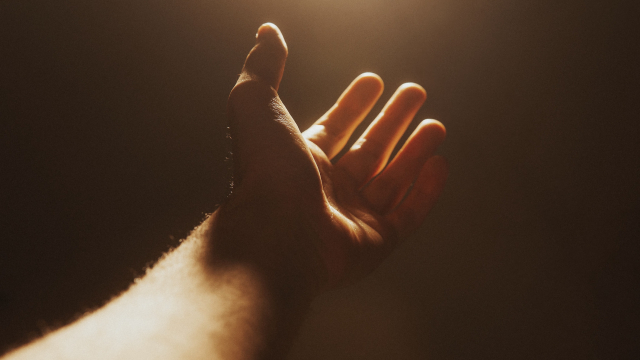 hand_reaching_out_light_unsplash