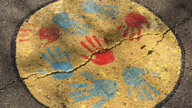 handprints_circle_paint_pavement_unsplash