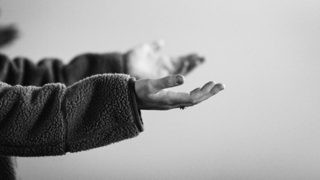 hands_outstretched_bw_unsplash