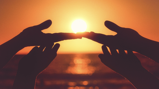 hands_sunrise_sea_unsplash