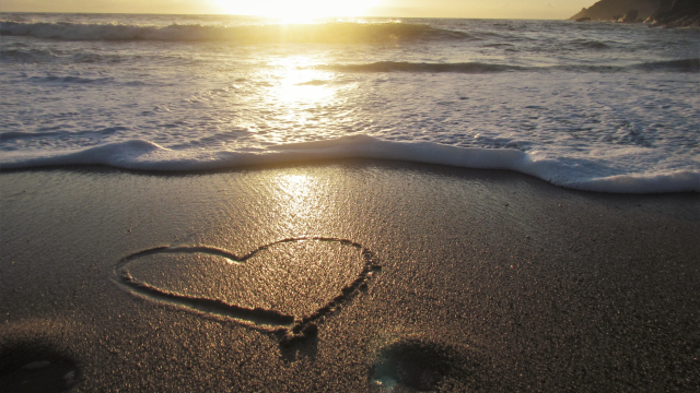 heart_beach_sunrise_sand_unsplash
