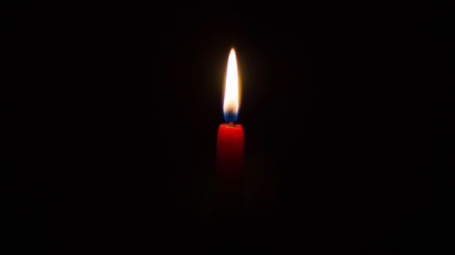lit_candle_darkness_unsplash