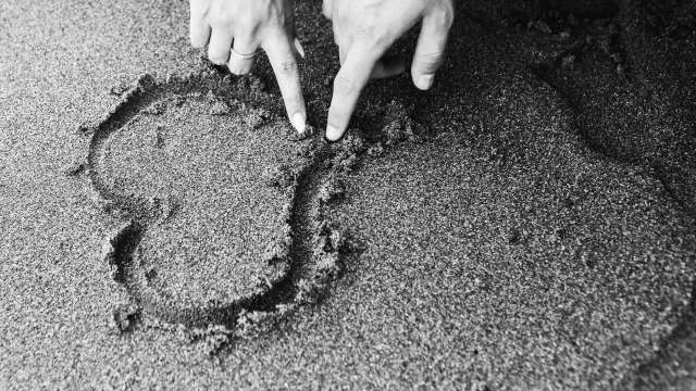 love_heart_sand_hands_unsplash