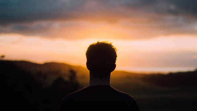 man_sunset_clouds