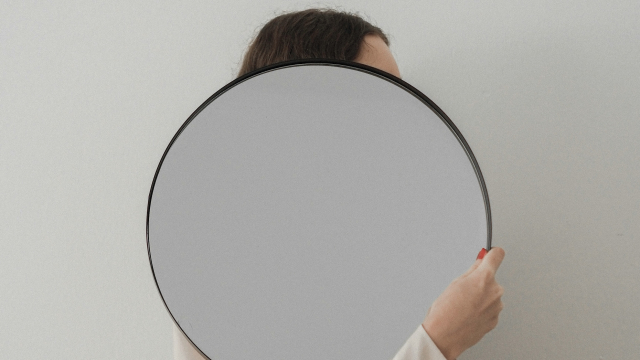 mirror_person_holding_unsplash