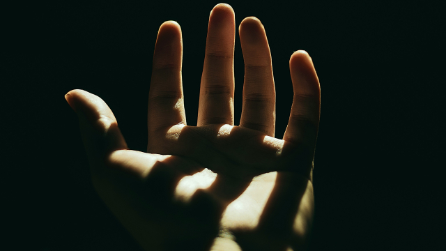 open_hand_shadows_stripes_unsplash