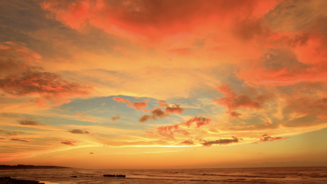 orange_clouds_sea_sunlight_unsplash