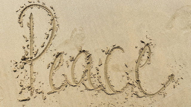 peace_sand_word_beach_unsplash