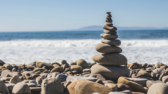 pebbles_balanced_beach_cairn_unsplash