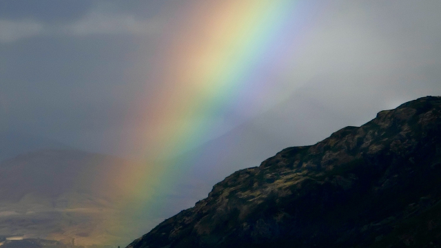 rainbow_dark_hill_unsplash