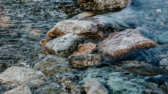 river_rocks_water_splashing_unsplash