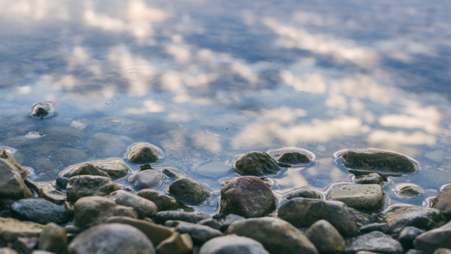 river_water_pebbles_reflection_unsplash