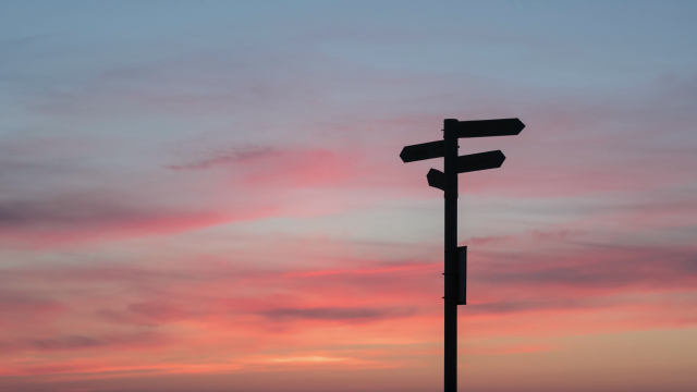 road_sign_sunset_unsplash