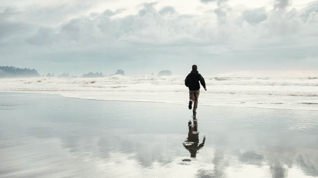 running_man_beach_clouds_unsplash