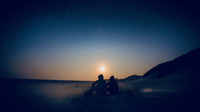 seated_beside_people_beach_unsplash