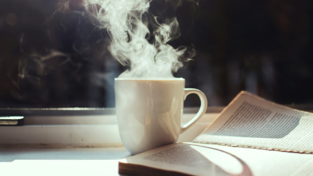 steaming_mug_book_windowsil_unsplash
