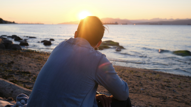 sunrise_beach_contemplation_sitting_unsplash