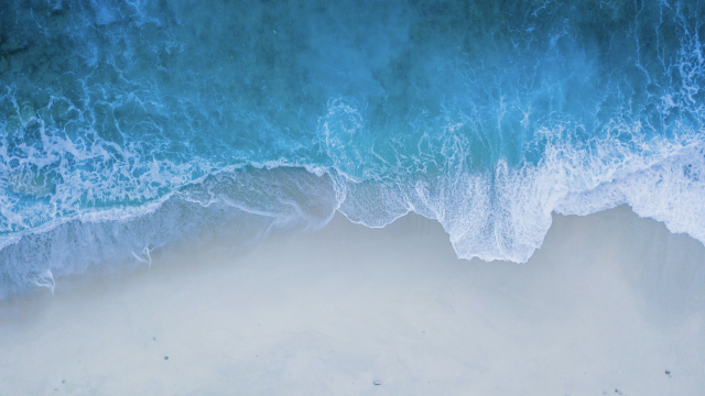 tide_beach_sea_aerial_unsplash