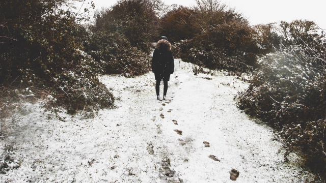 walking_footprints_snow_man_unsplash