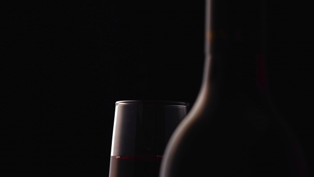 wine_glass_bottle_dark_unsplash