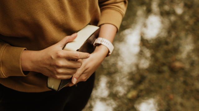 woman_holding_bible_unsplash