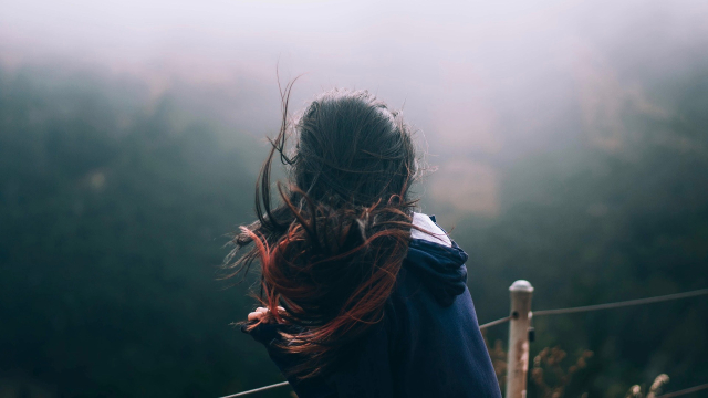 woman_windswept_landscape